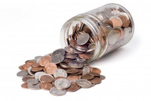 Coins Spilling from a Jar